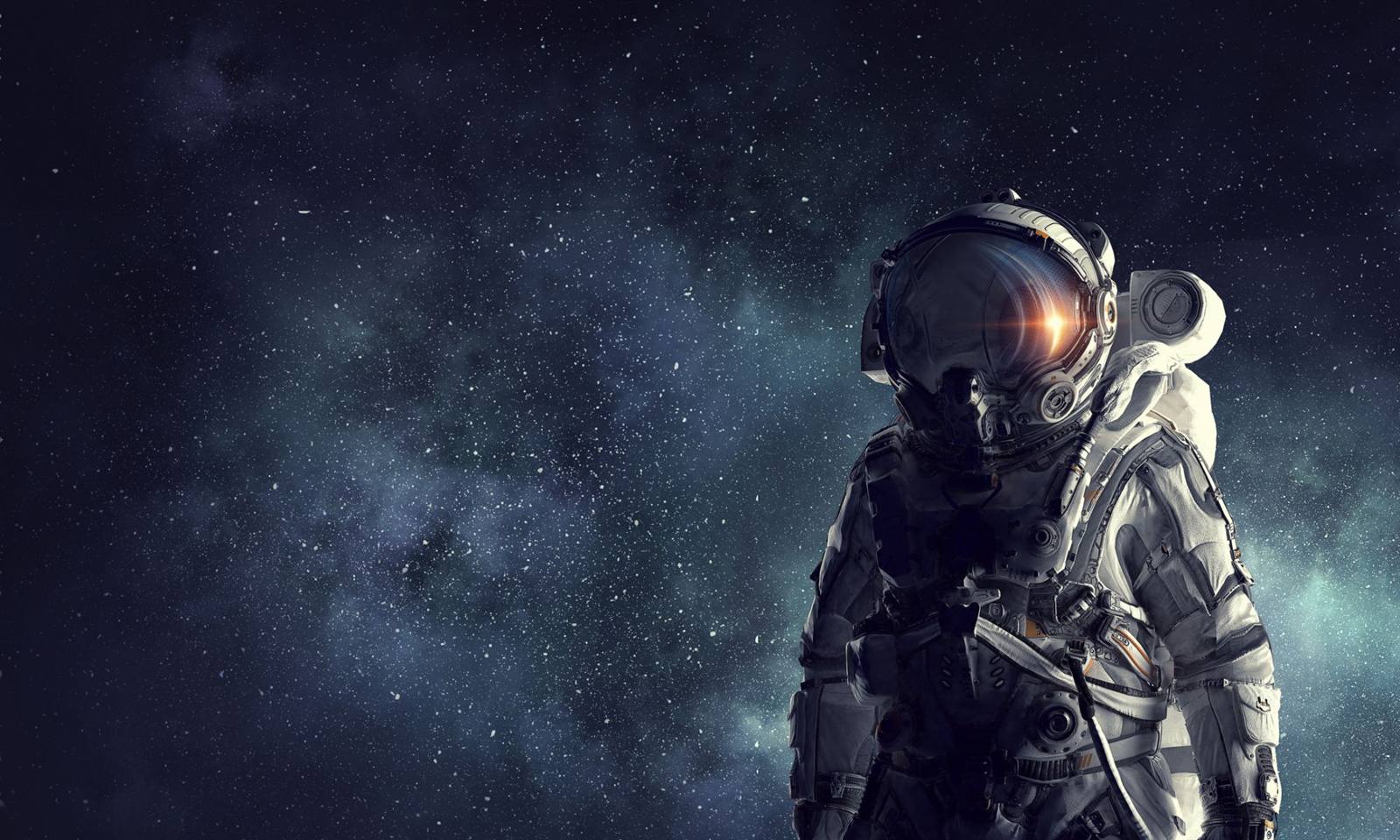 An astronaut in a spacesuit against a starfield