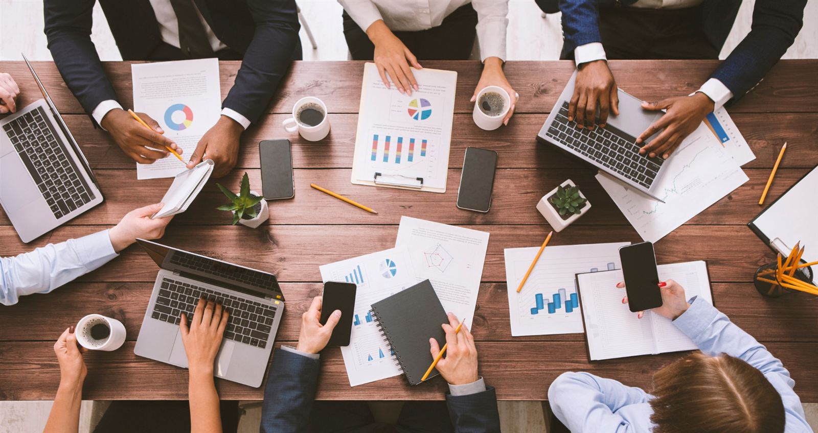 A team gathered around a table, planning strategy